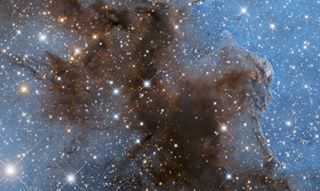 This Hubble Space Telescope photo shows just a slice of the Carina Nebula, a stellar nursery that lies 7,500 light-years from Earth. The whole nebula is too massive to capture in one image.