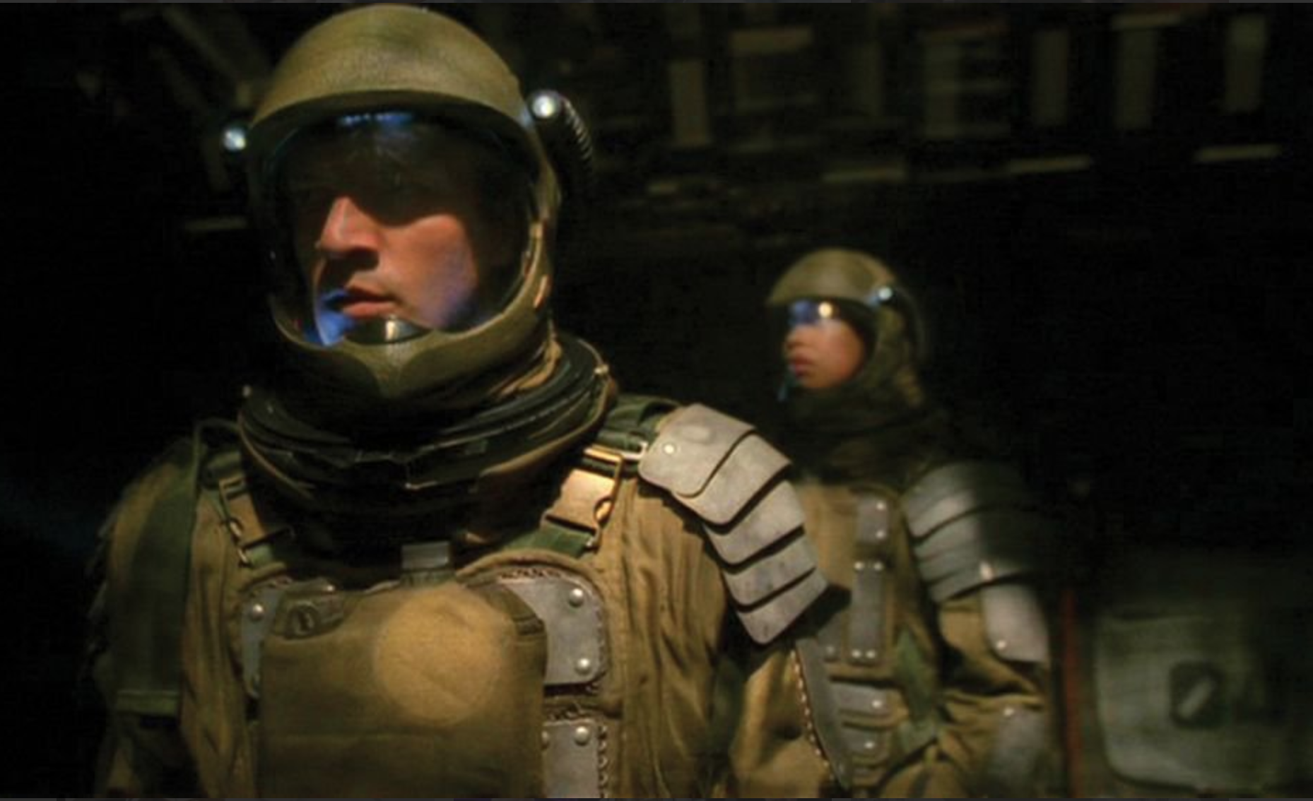two people in armored spacesuits in a Hollywood sci-fi project