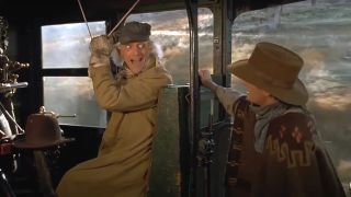 Christopher Lloyd gleefully pulls the train whistle in Back To The Future: Part III.