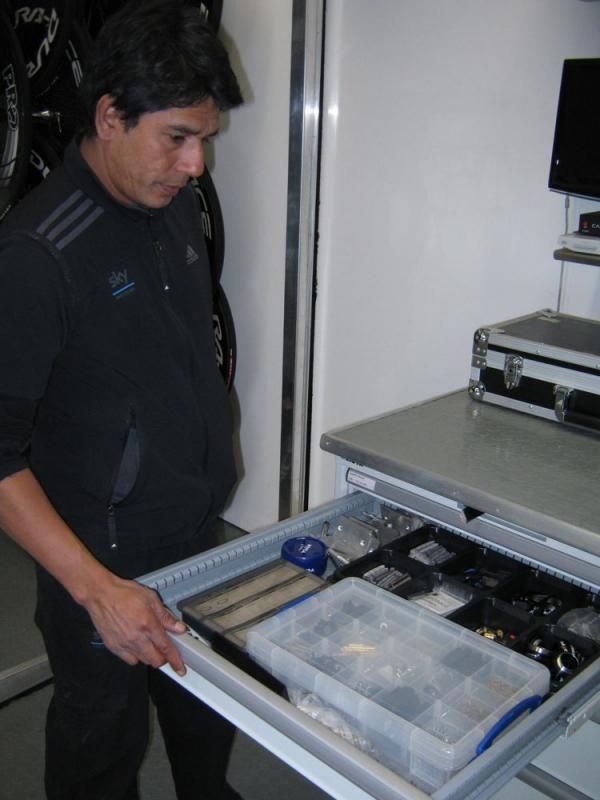 Rajen shows the spare parts that are kept in the truck