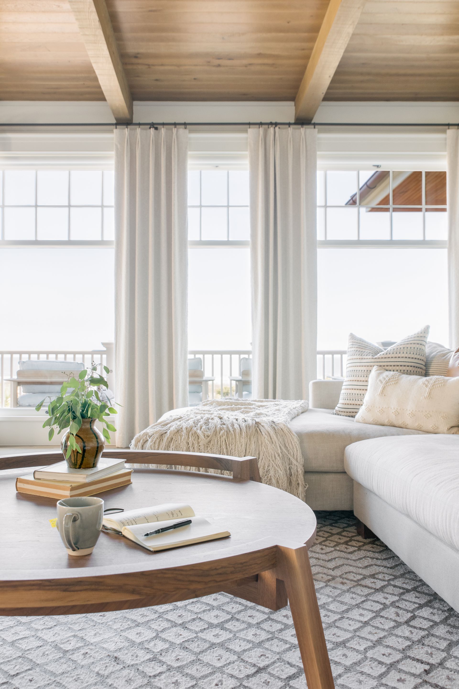 Living room with creams, greys and wooden table