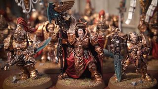 The heroes of Adeptus Custodes lead the charge on a Warhammer 40,000 battlefield