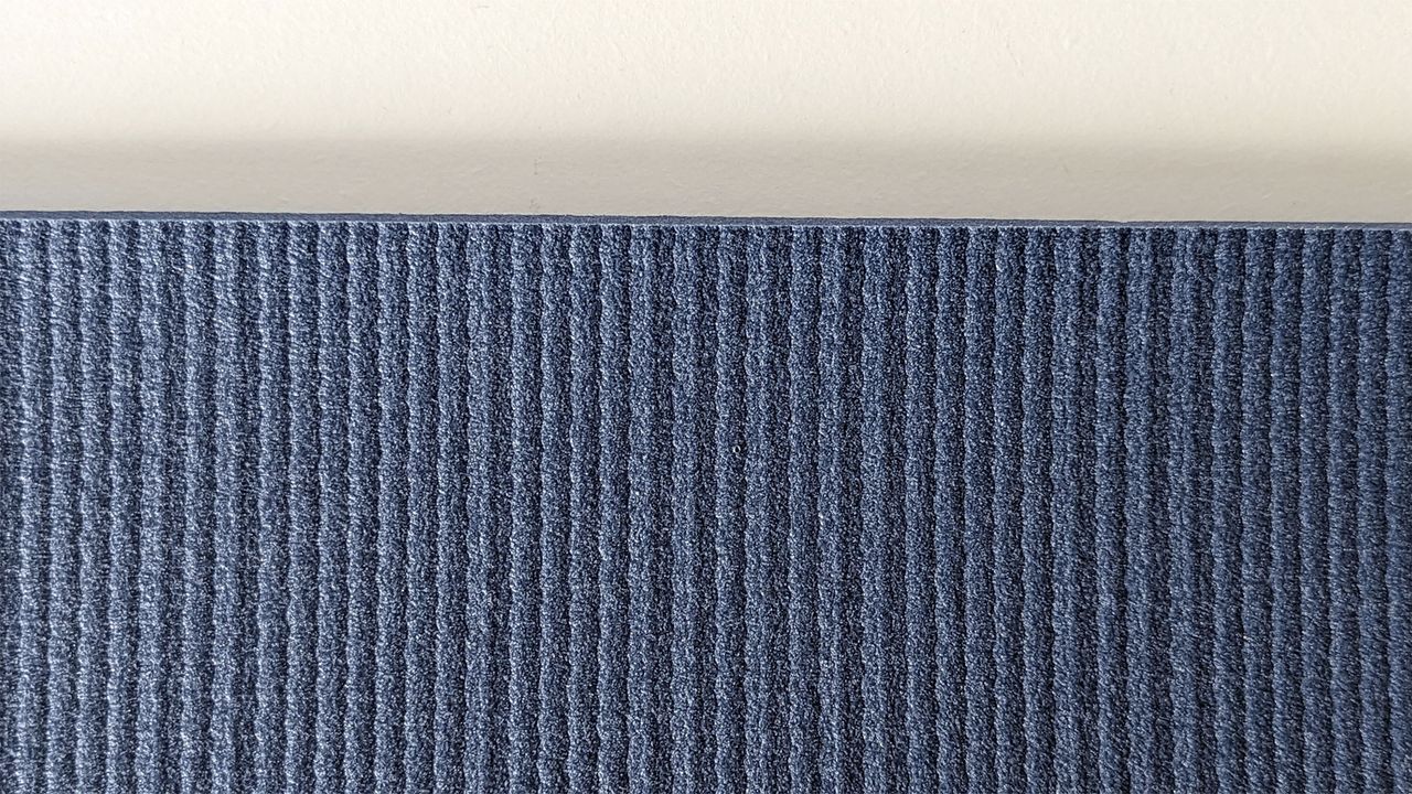 Close up of the ribbed textured side of the Manduka PRO yoga mat