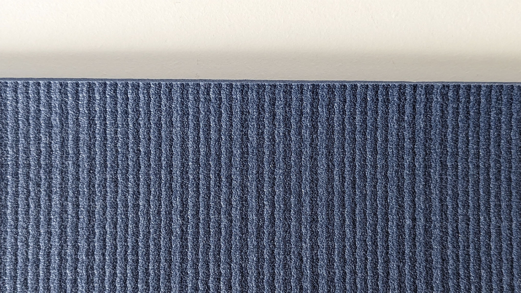 Close up of the ribbed textured side of the Manduka PRO yoga mat