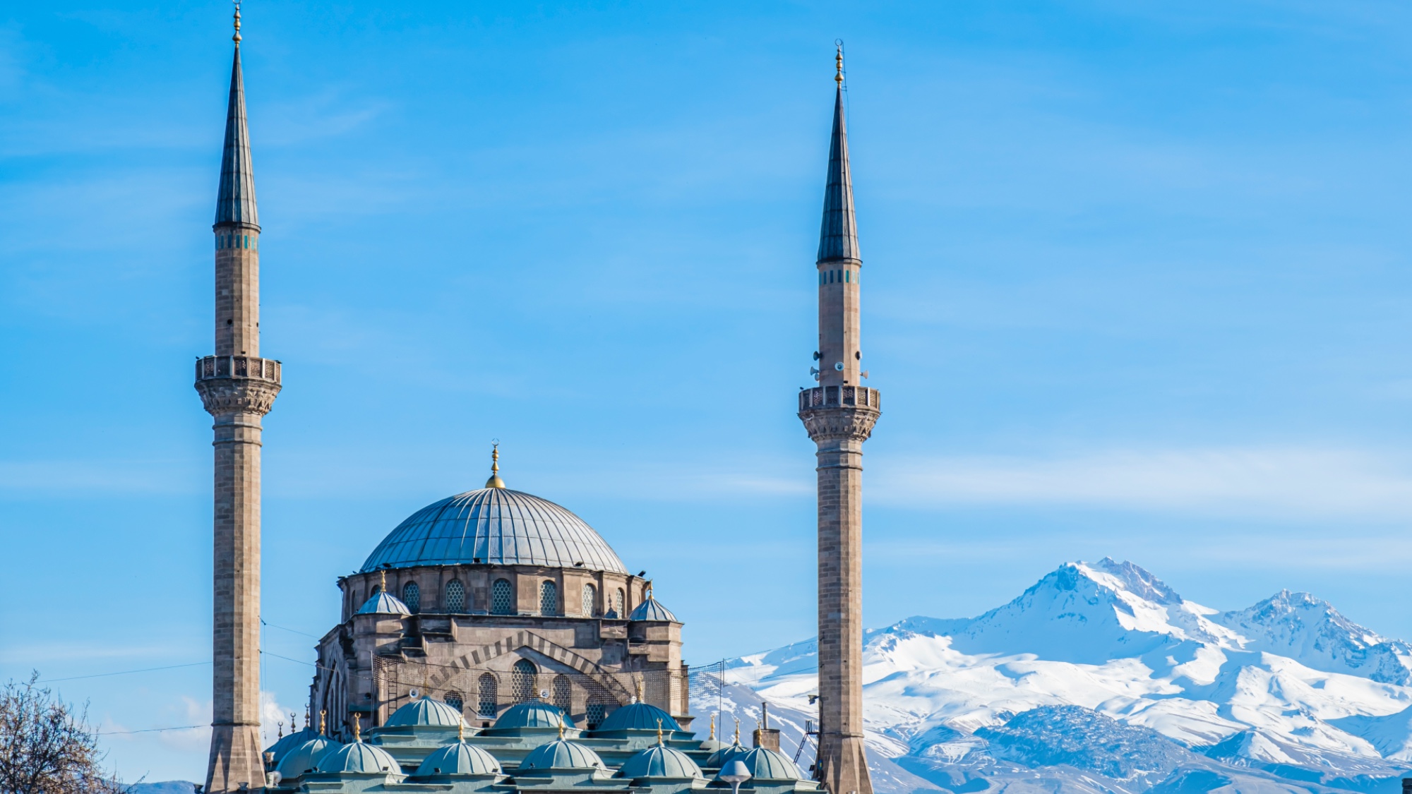 The mosque at Kayseri with snowy mount Erciyes behind