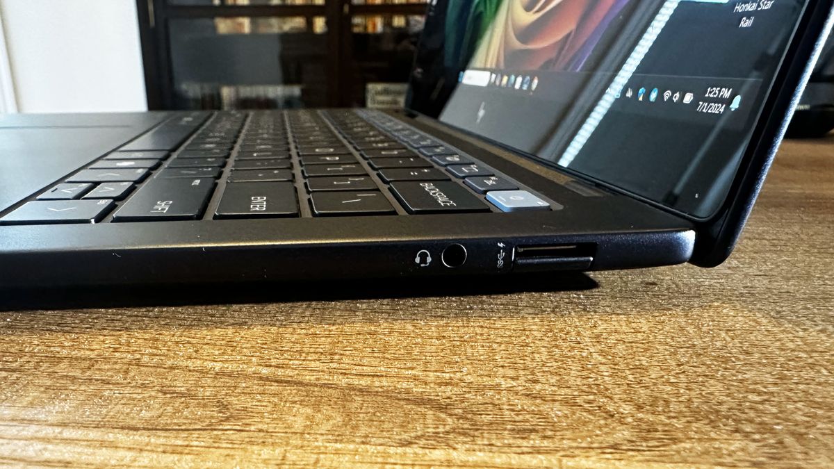 A close up of ports on the side of a laptop.