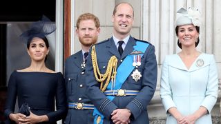 Meghan, Duchess of Sussex, Prince Harry, Duke of Sussex, Prince William, Duke of Cambridge and Catherine, Duchess of Cambridge watch the RAF flypast