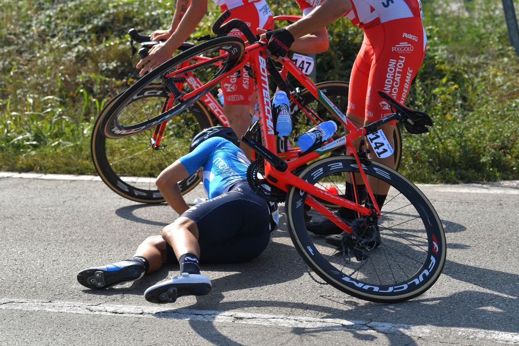 Mikel Landa on the ground after being caught up in a crash