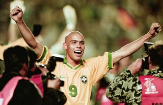 Ronaldo celebrates Brazil's win over Bolivia in the final of the 1997 Copa America.