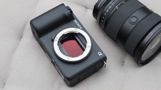 Sony ZV-E1 digital camera on a grey surface