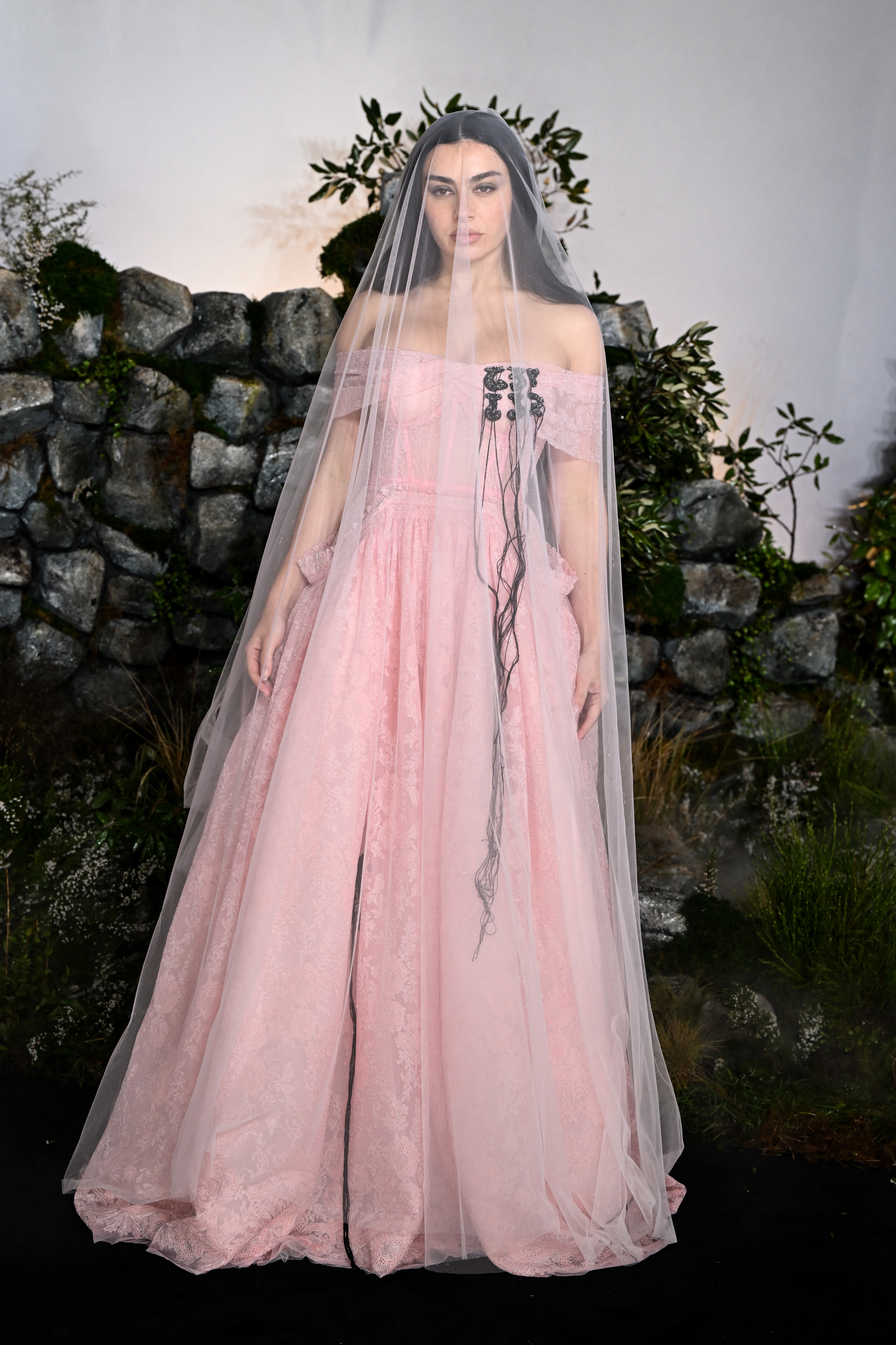 Charli xcx arrived at the London premiere of Wuthering Heights looking every bit a brat bride in a pink gown and veil