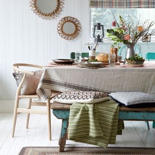 wooden chair with mirror bench and cushions