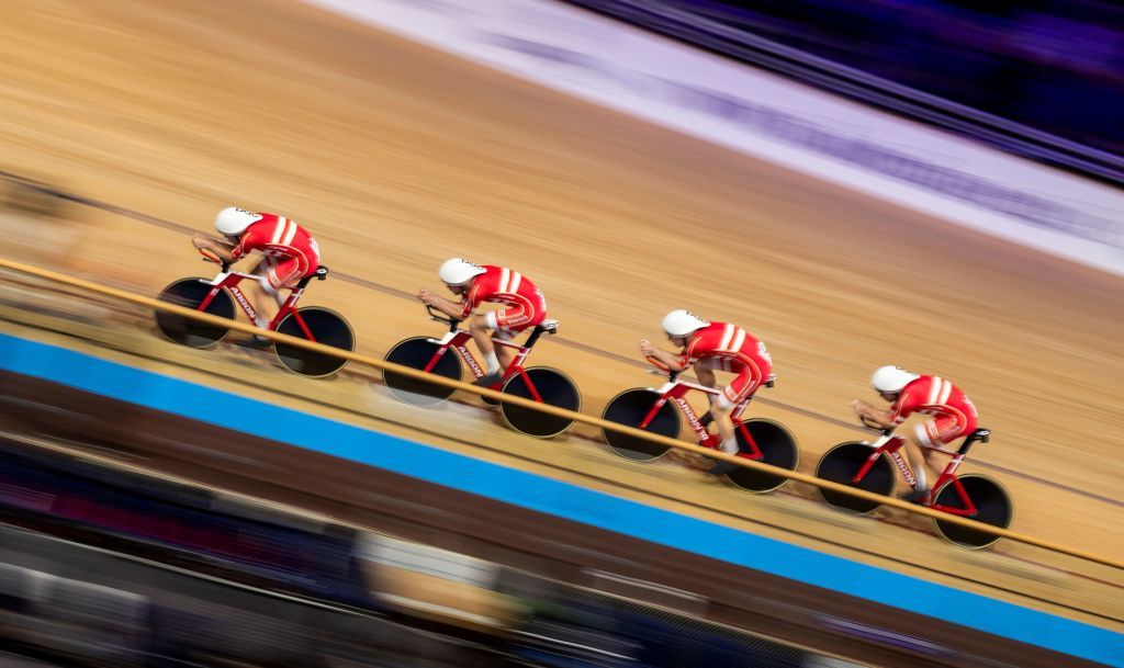 Denmarks team Lasse Norman Hansen Julius Johansen Frederik Rodenberg Madsen and Rasmus Pedersen on their way to set a new world record compete in the Mens Team Pursuit qualifying at the UCI track cycling World Championship in Berlin on February 26 2020 Photo by Odd ANDERSEN AFP Photo by ODD ANDERSENAFP via Getty Images