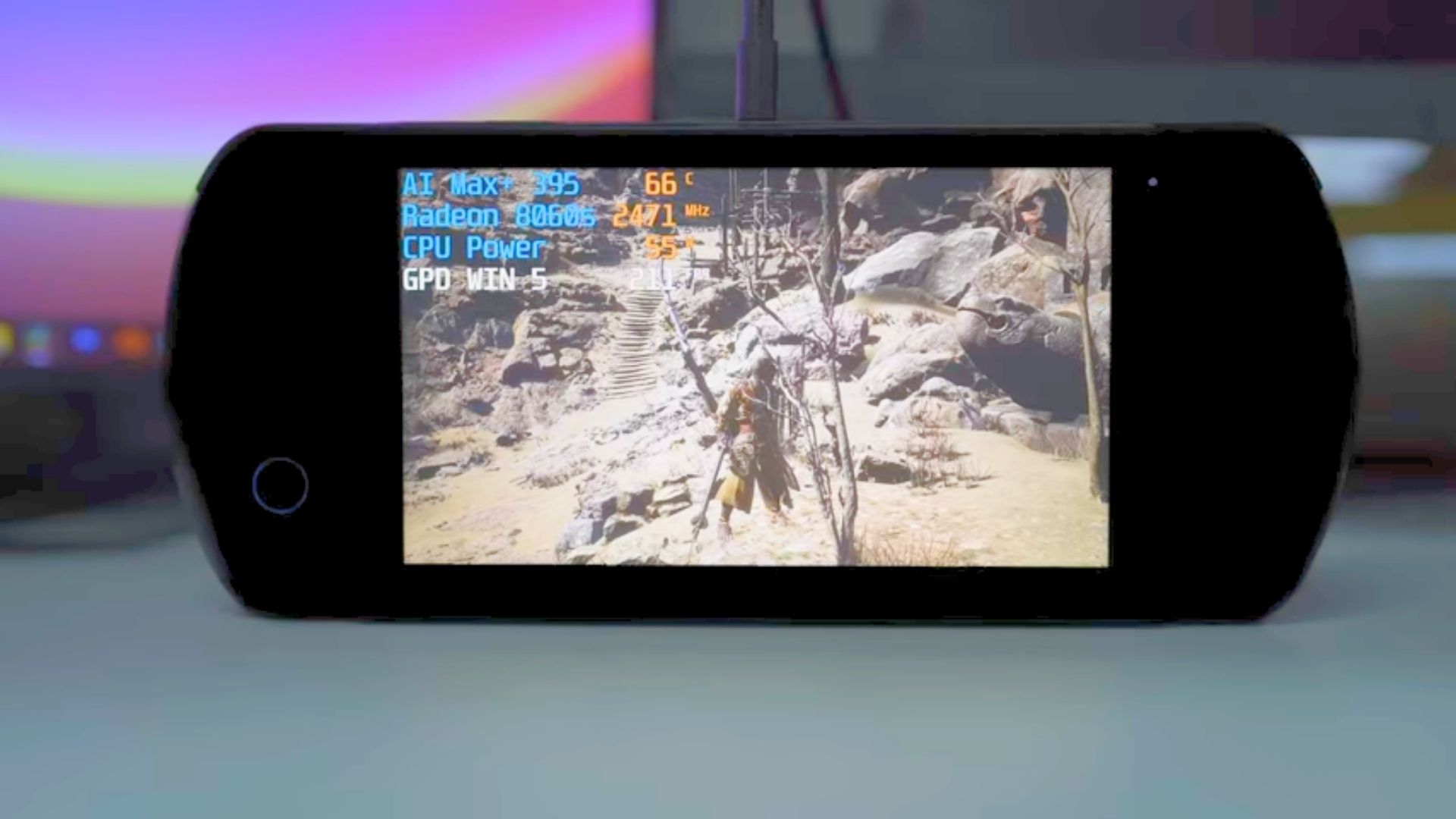 PGD Win 5 gaming handheld on a table
