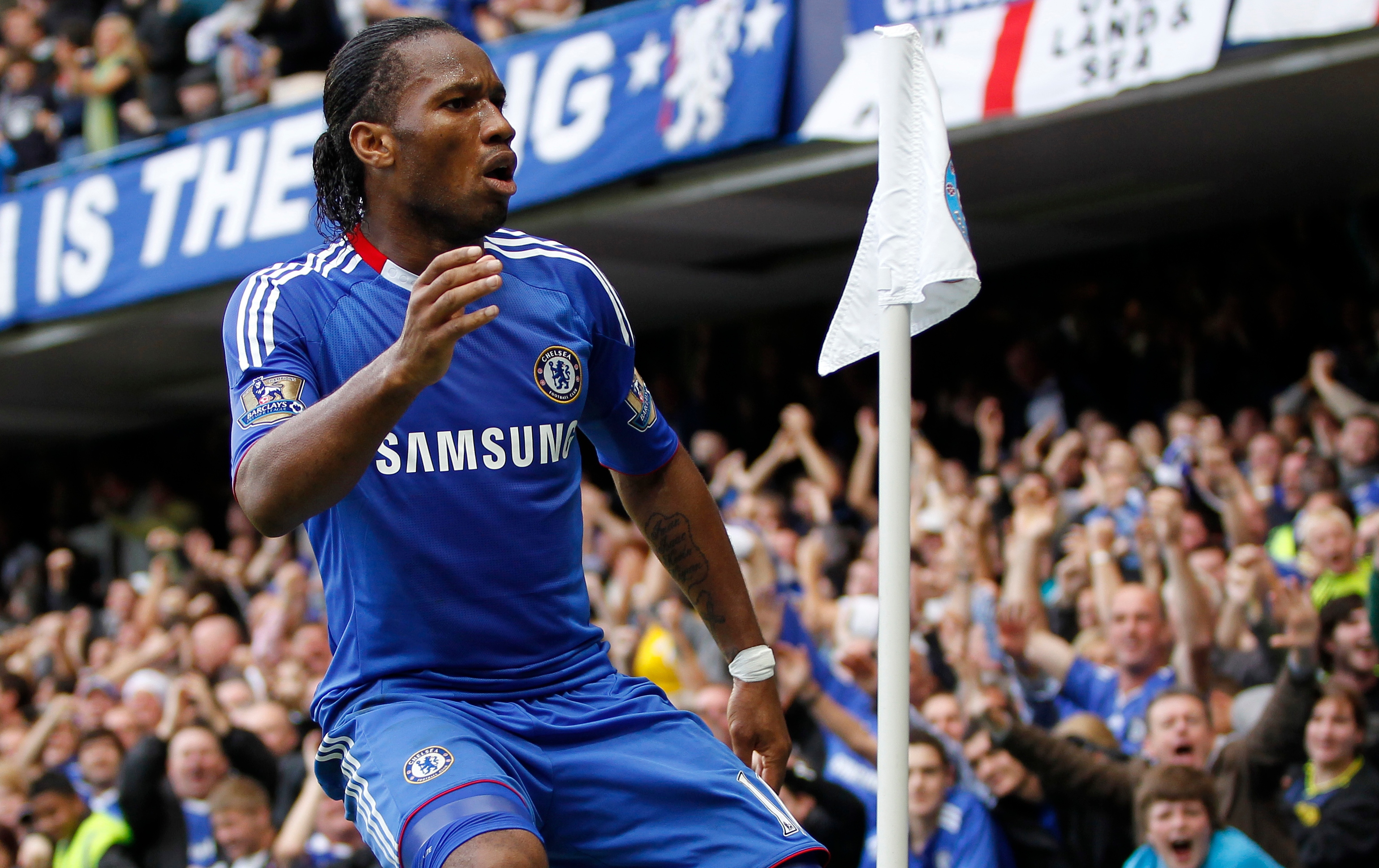 Didier Drogba celebrates a goal for Chelsea.