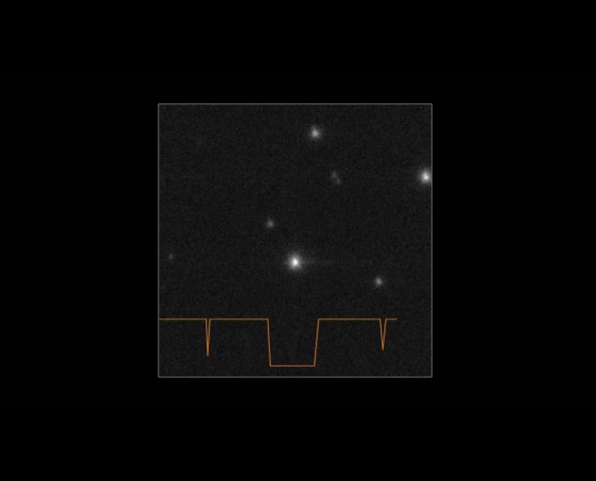 A black square with a lighter grey square inside it with a jagged orange line running across its base