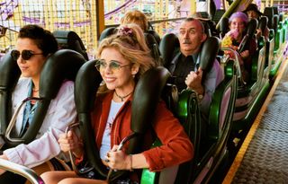 Michelle, Erin and the rest of the Derry Girls cast ride the rollercoaster in Derry Girls season 3.