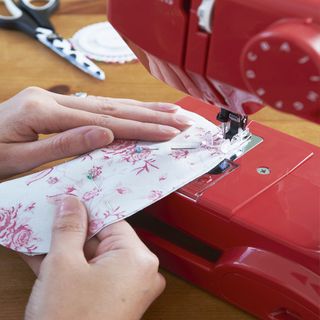 stitching floral cloth for making hanging heart