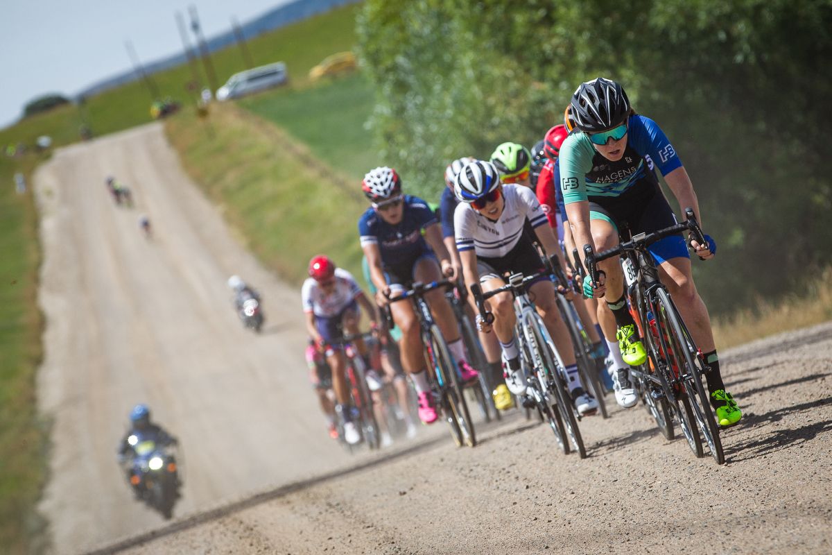 Whitney Allison (Hagens Berman-Supermint) leads the front group through the gravel section on stage 1 of the Colorado Classic on August 22, 2019 in Steamboat Springs, Colorado.
