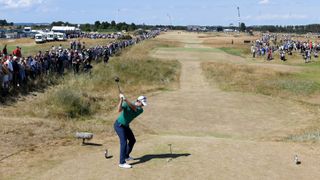 Justin Rose of England tees off at the 6th hole during round one of the 147th Open Championship at Carnoustie Golf Club