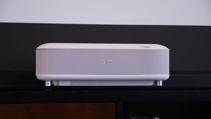 The Epson LifeStudio Grand Projector pictured against a dark surface