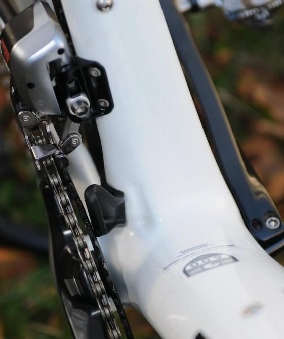 Trek's tidy proprietry chain catcher neatly fits on the side of the seat tube