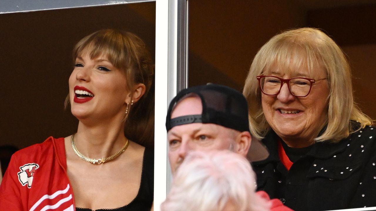 Taylor Swift and Donna Kelce smiling while watching a Kansas City Chiefs and Denver Broncos game in Kansas City on October 12, 2023