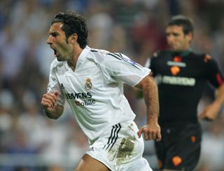Luis Figo celebrates after scoring for Real Madrid against Roma in 2004.