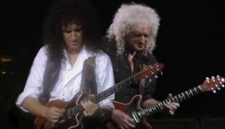 Brian May (left) jams with... Brian May