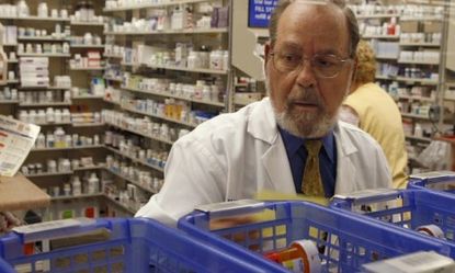 A Florida pharmacist fills prescriptions: Six of the 10 top-selling drugs will go generic in the next two years, which will make them cheaper for patients.