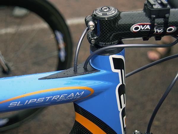 Derailleur housings are fed into the top tube right behind the stem where the air is already 'dirty'.