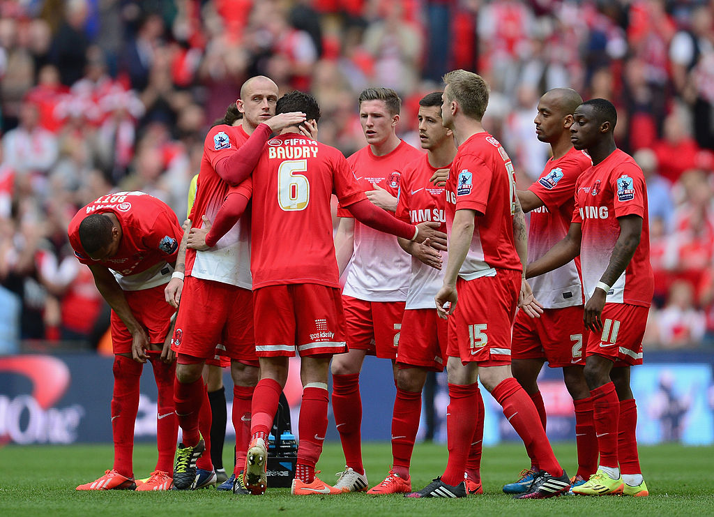 Leyton Orient players react to their 2014 League One play-off final defeat