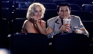 True Romance Patricia Arquette and Christian Slater enjoy a movie with some snacks