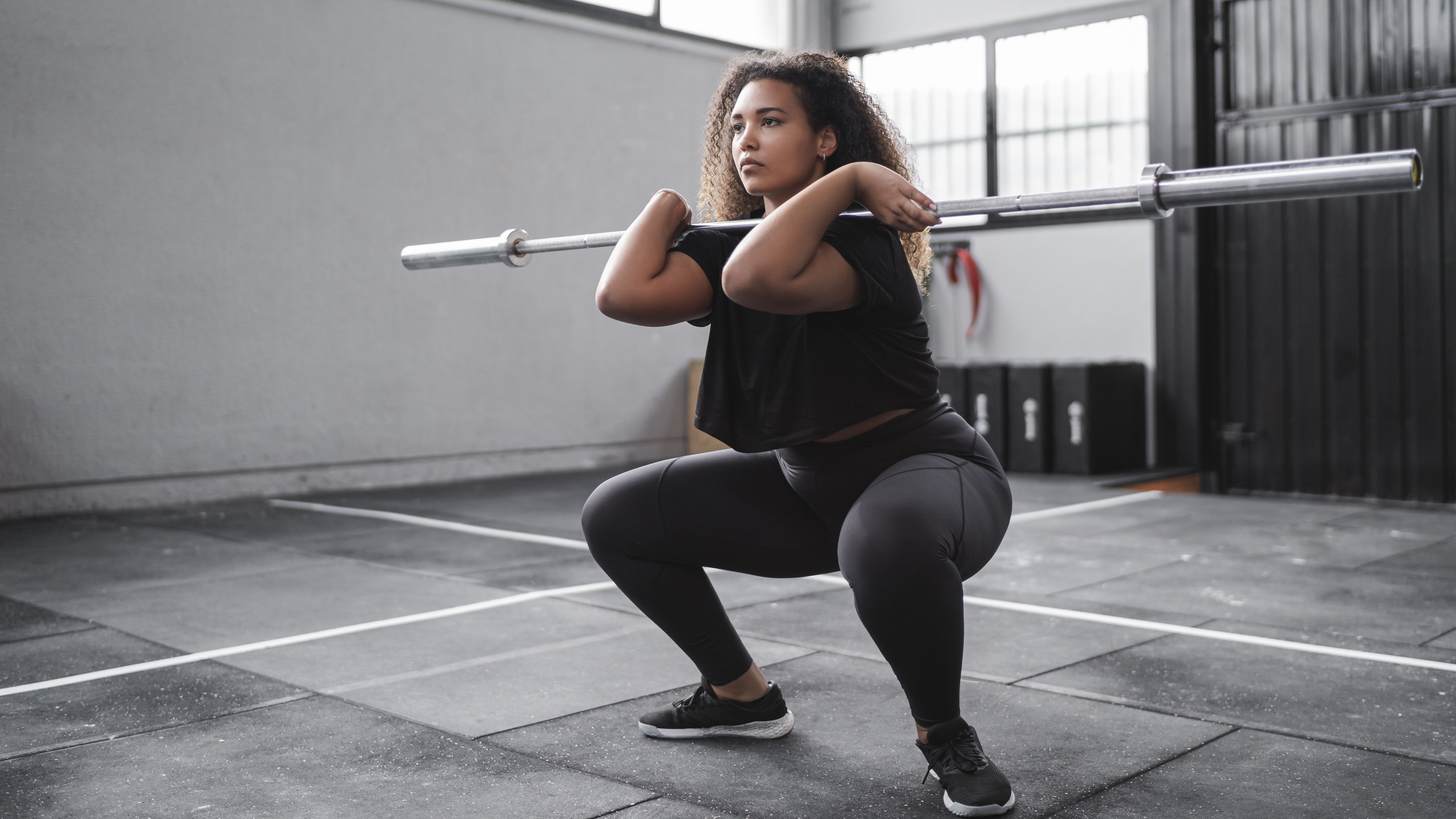 The Dumbbell Squat: Proper Form, Benefits, and Variations - The