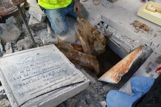 Construction workers opened the Clear Lake Theatre time capsule to find it filled with water, 50 years to the day after it was buried on April 20, 1966.