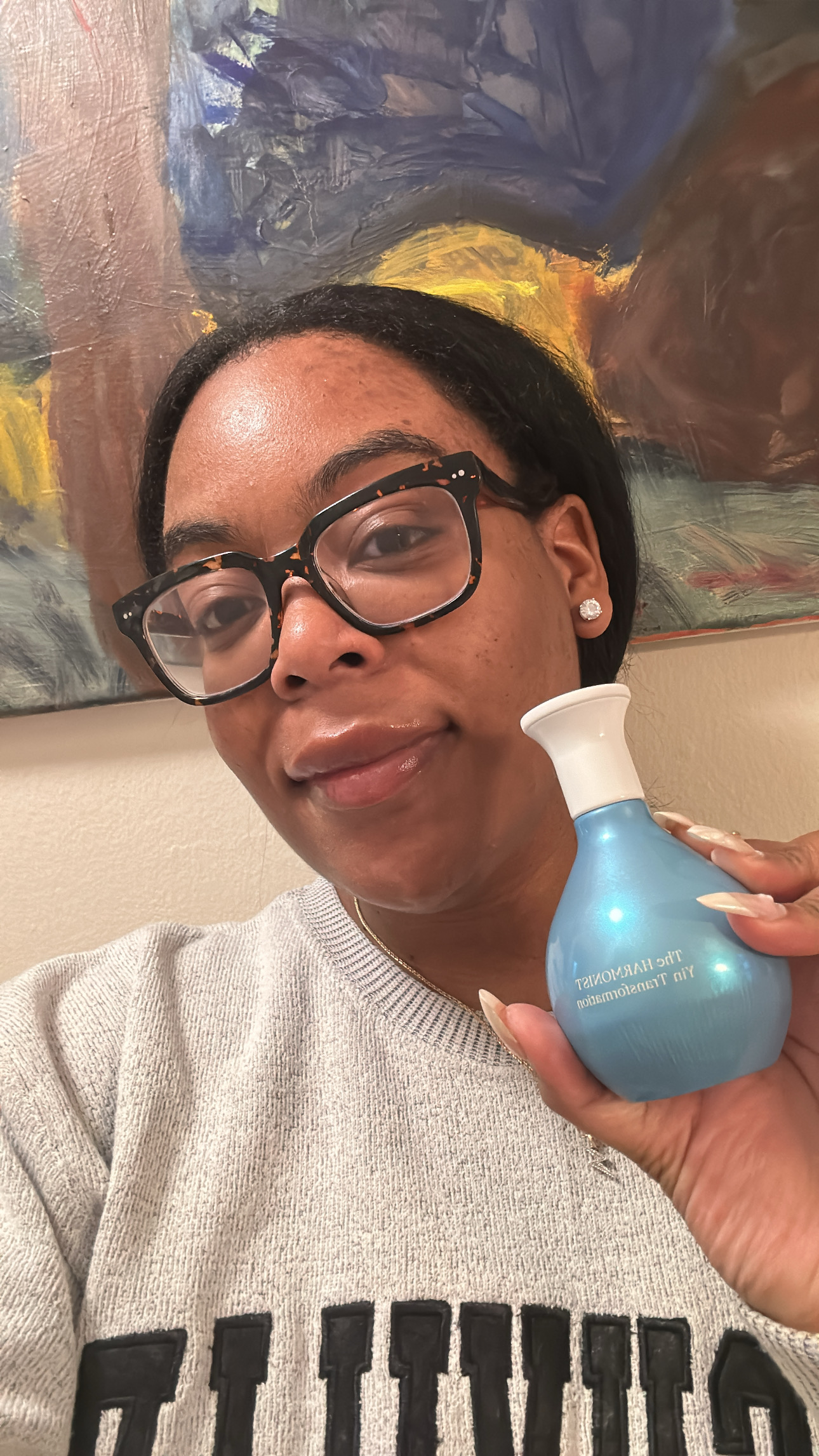 Ariel Baker testing Yin Tranformation perfume.