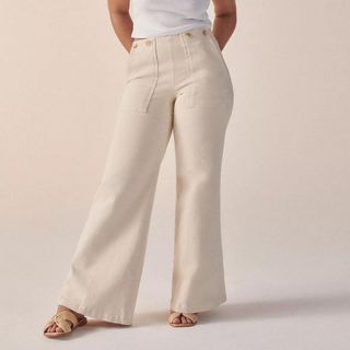 model wearing anthropologie white utility pants
