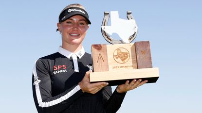 Charley Hull with the trophy after winning the 2022 Volunteers of America Classic