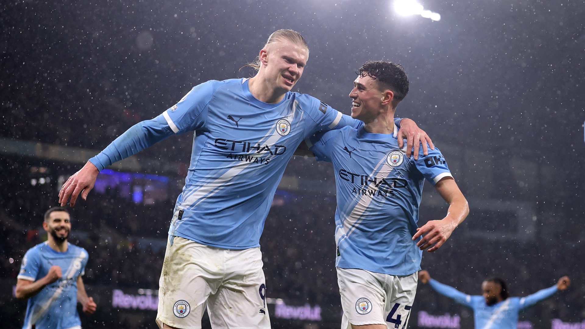 MANCHESTER, ENGLAND - FEBRUARY 11: Erling Haaland of Manchester City celebrates scoring his team's third goal with teammate Phil Foden during the Premier League match between Manchester City and Fulham at Etihad Stadium on February 11, 2026 in Manchester, England. (Photo by Carl Recine/Getty Images)