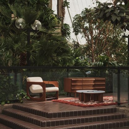 The conservatory at the Barbican with a display of a few pieces from the MADE x Barbican homeware collection including the Plinth coffee table and the Dual armchair