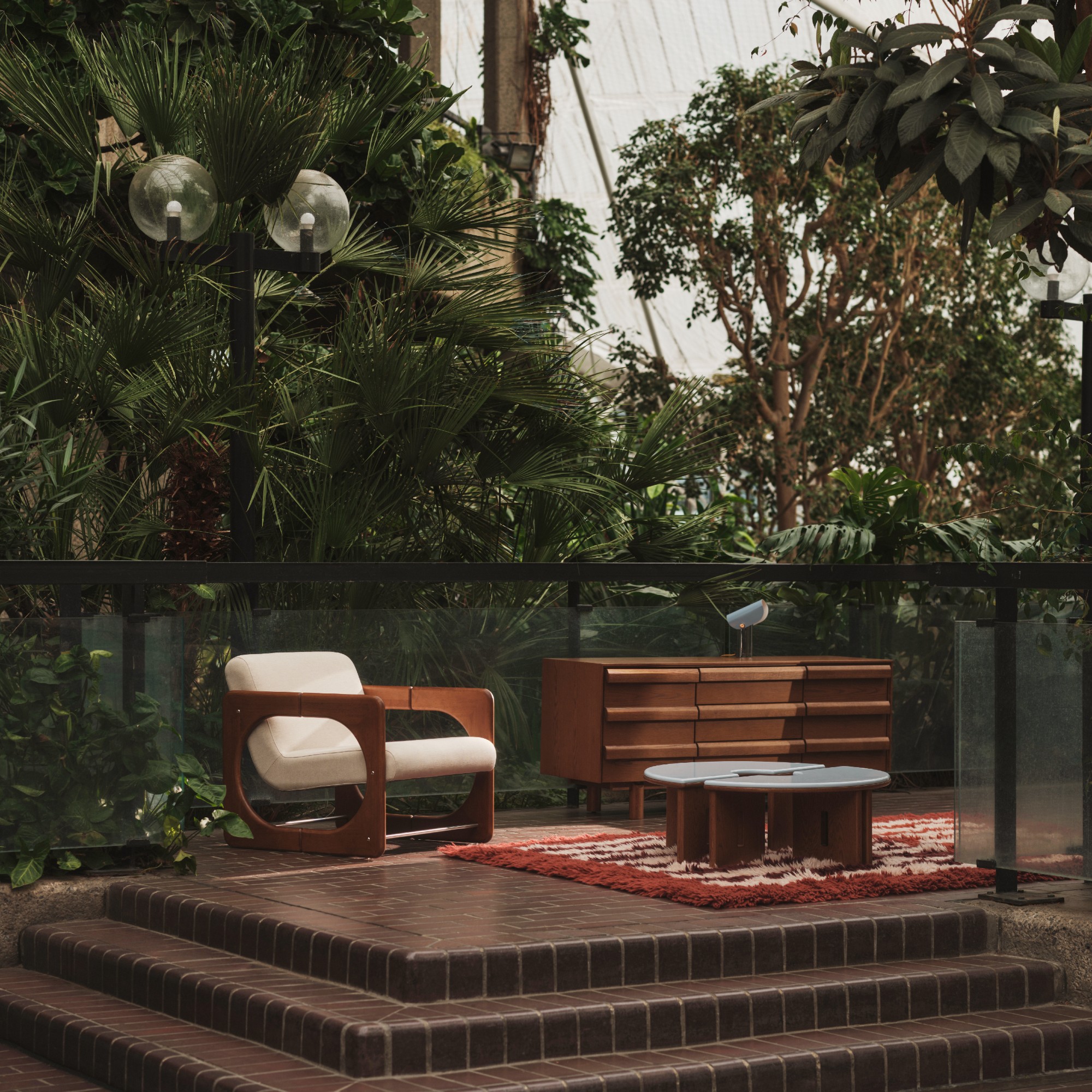 The conservatory at the Barbican with a display of a few pieces from the MADE x Barbican homeware collection including the Plinth coffee table and the Dual armchair