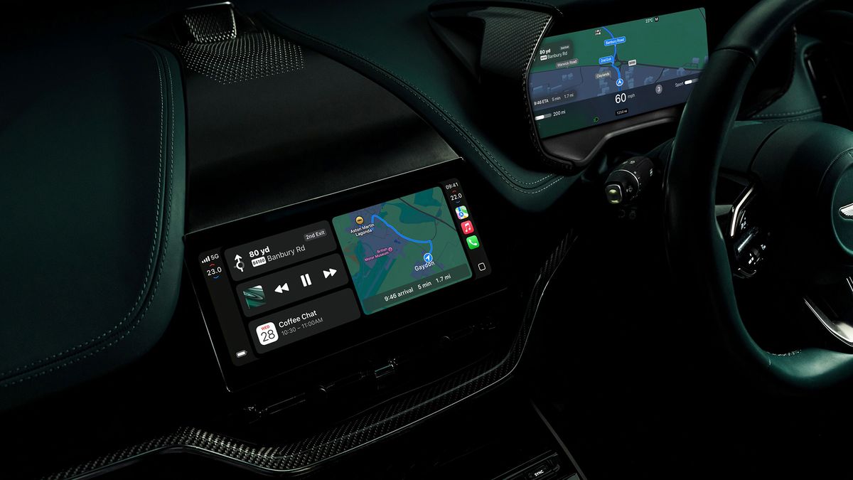 The interior of an Aston Martin car showing Apple CarPlay Ultra