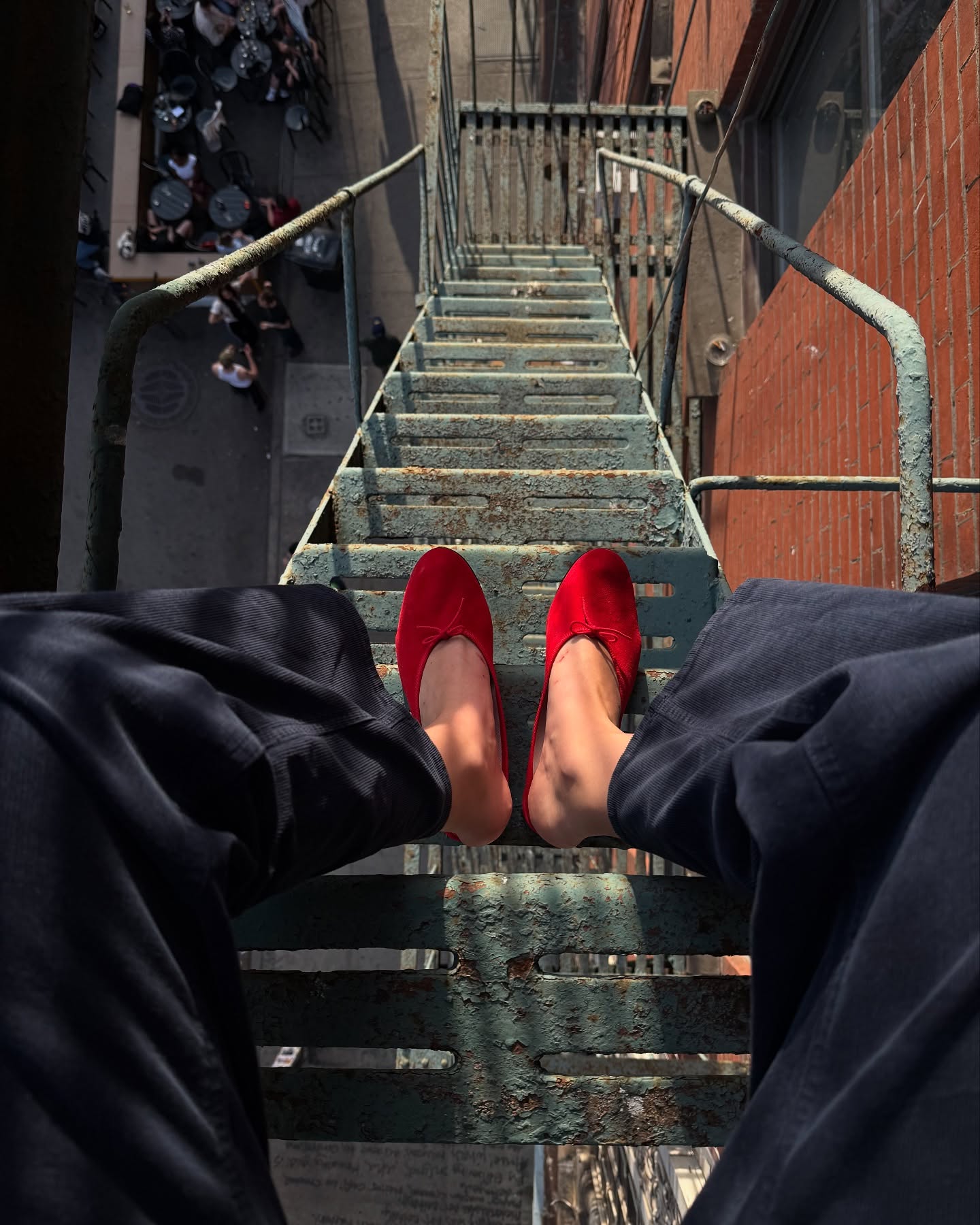 An image of @lizzyhadfield wearing summer work shoes.