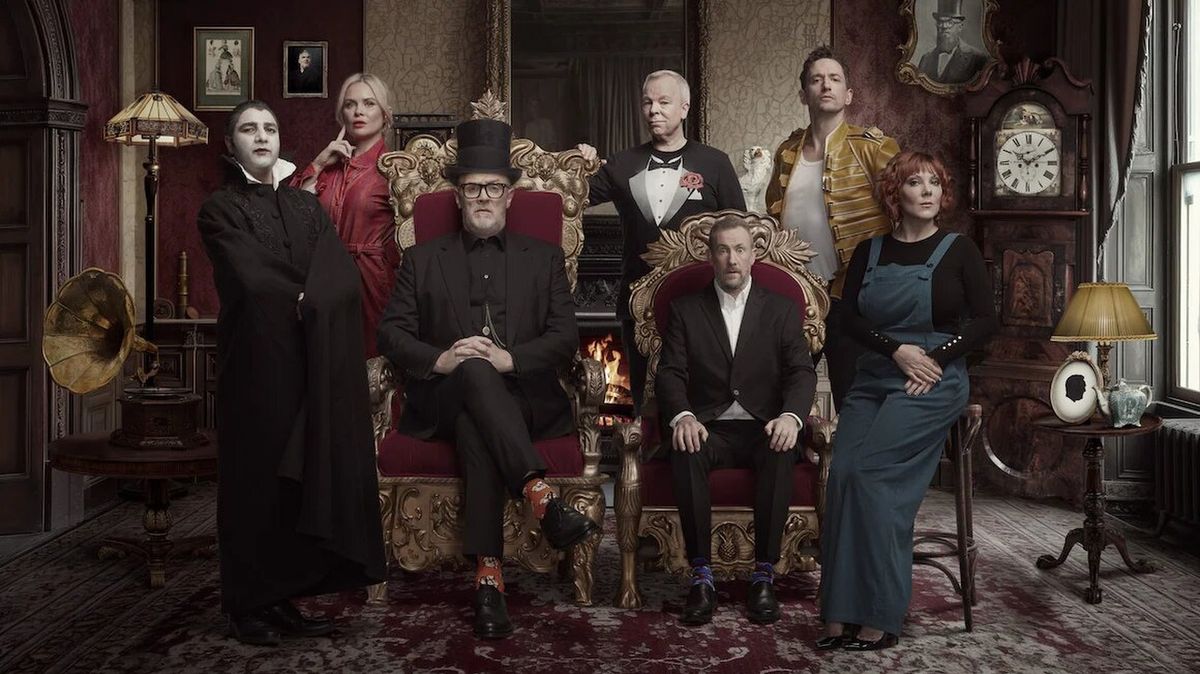 Greg Davies and Alex Horne are flanked by the cast of Taskmaster season 17 in an Edwardian themed promo image