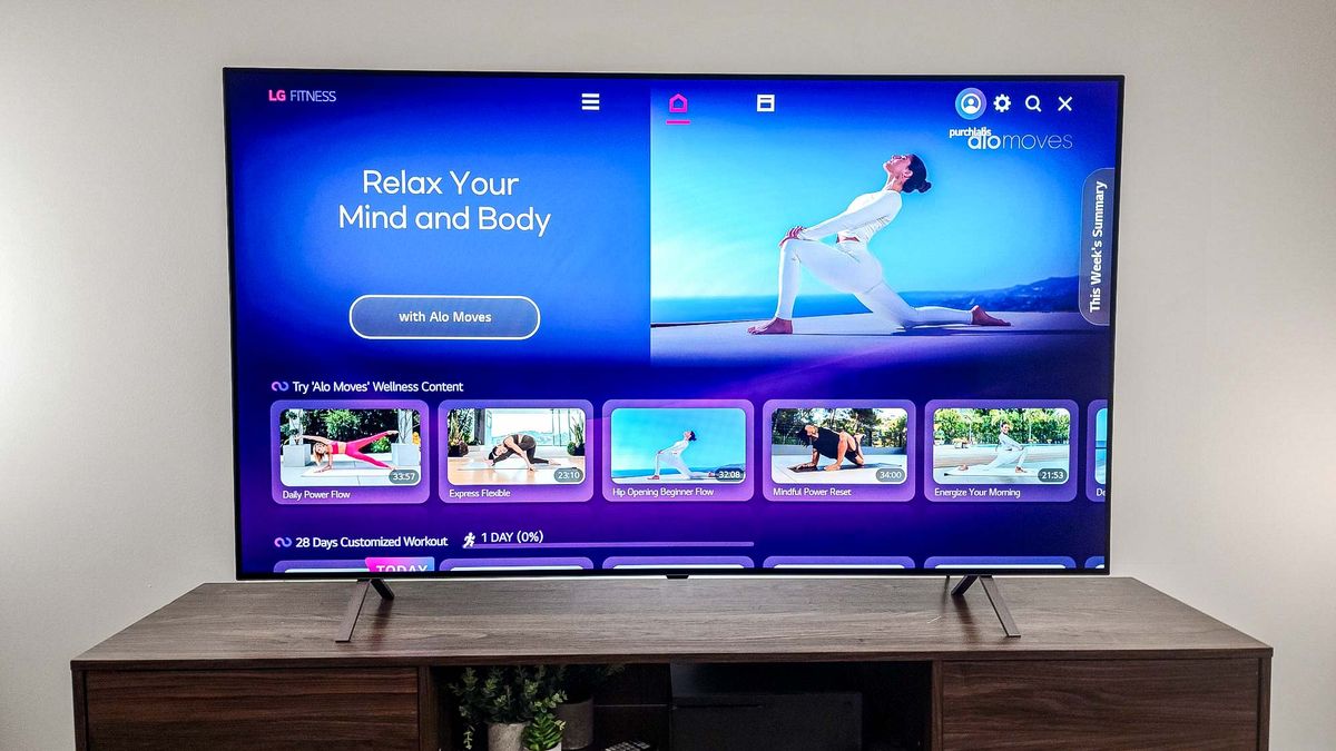 LG B4 OLED TV on table in living room