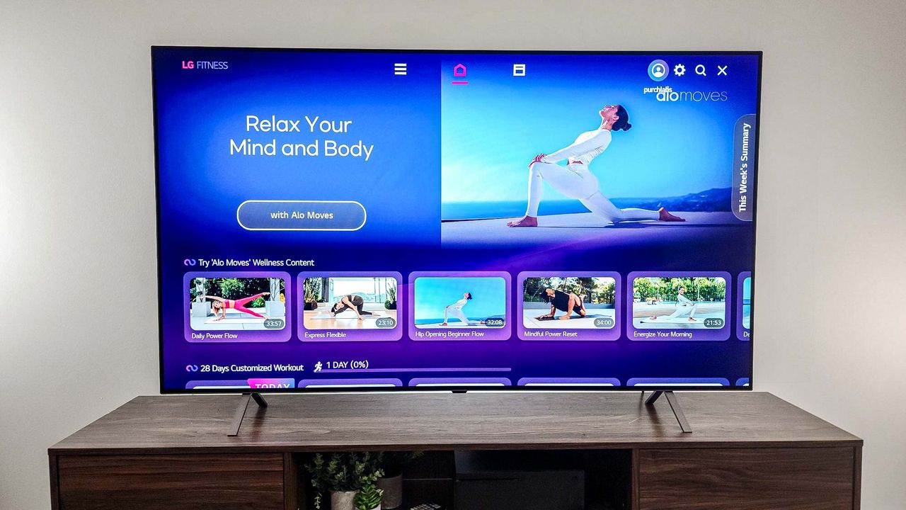 LG B4 OLED TV on table in living room