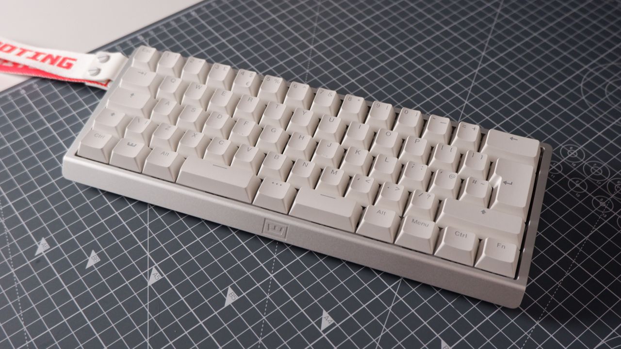 The Wooting 60HE v2 at various stages of being built.