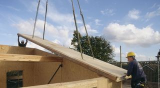 builders using structural insulated panels to build a house