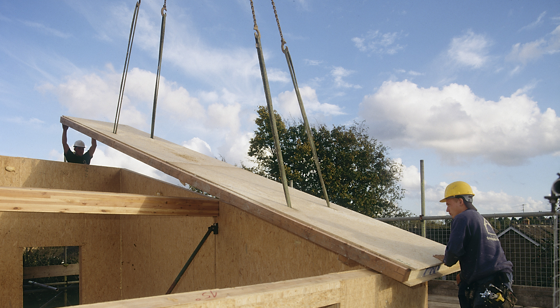 builders using structural insulated panels to build a house