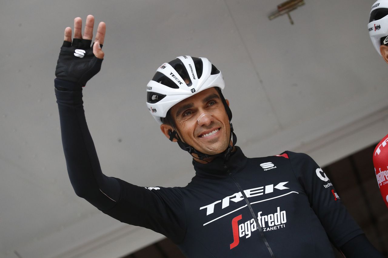 Alberto Contador waves to fans at the Crit&eacute;rium du Dauphin&eacute;.
